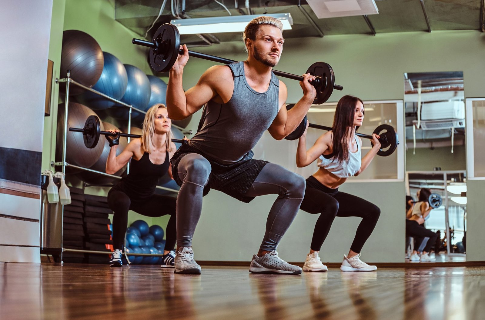 group-of-people-exercising-with-barbell-doing-squa-JUWGZQJ.jpg group-of-people-exercising-with-barbell-doing-squa-JUWGZQJ.jpg
